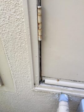 Rotting utility doorjamb