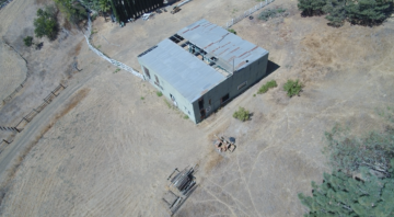 Aerial view of stable after cleanup