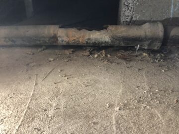 Rusting sewer pipe