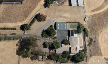 Satellite image showing driveway fence