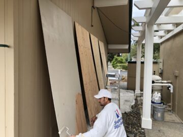 Prepping new siding boards