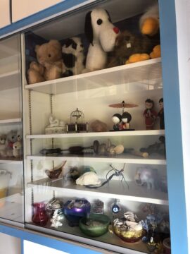 Knickknack shelf with childhood toys